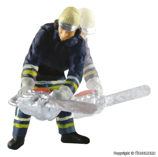 H0 Feuerwehrm. m.Kettensaege